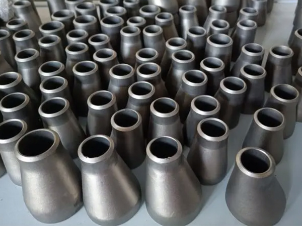 Titanium pipe fittings